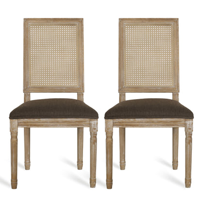 Two French Country Dining Chairs with rectangular cane backrests and smooth upholstered seats, carved legs, and a light wood finish are shown side by side against a white background.