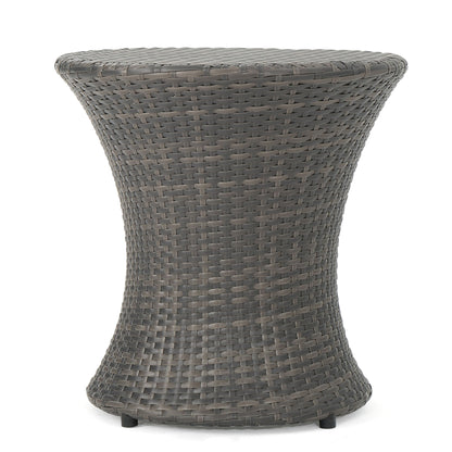 The Thrive Hourglass Rattan Table, featuring a woven brown wicker design without a glass top, is shown against a plain white background.