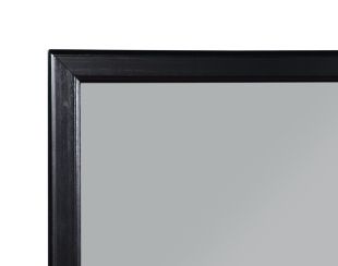 A close-up of the top left corner of the Louis Philippe - Bedroom Mirror, Elegant Design, featuring a black frame and reflecting a plain, light gray surface.
