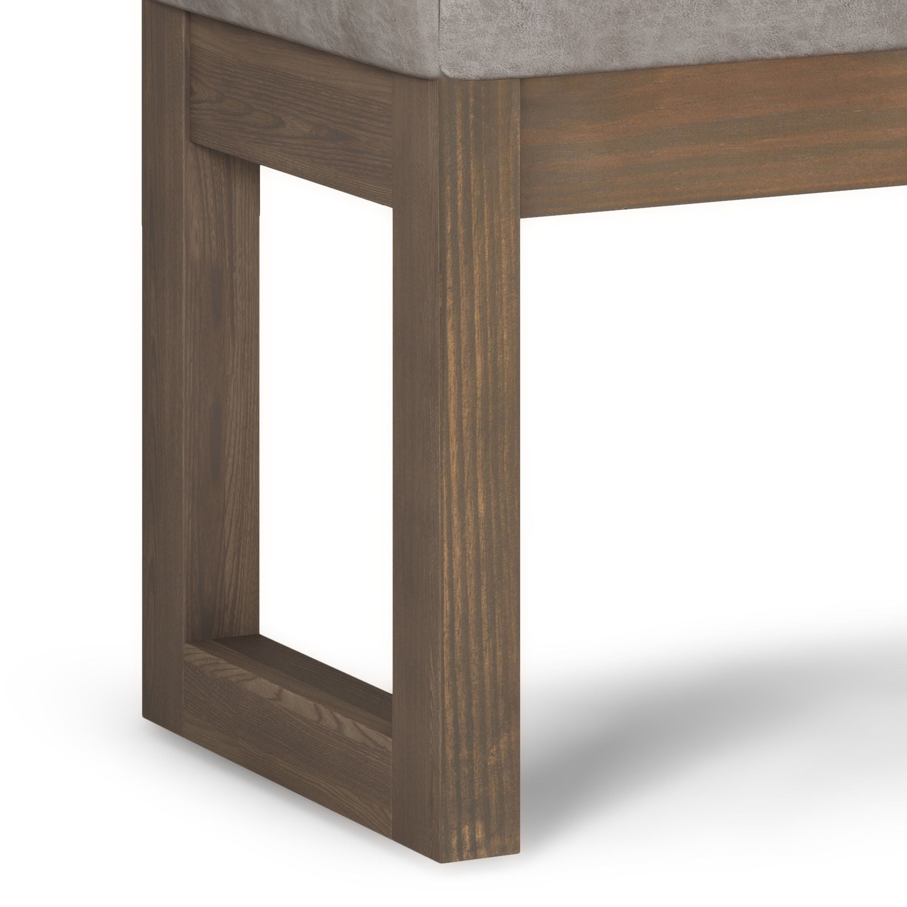 Close-up of Milltown - Upholstered Ottoman Bench leg with a rectangular open-frame design in light brown, topped with a seat upholstered in light gray fabric.