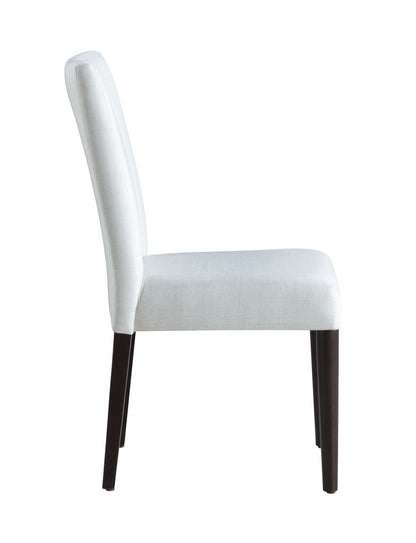 Side view of the Carena - Side Chair (Set of 2) in white, featuring a modern design with upholstered seat and backrest, four straight dark wooden legs, shown against a plain white background.