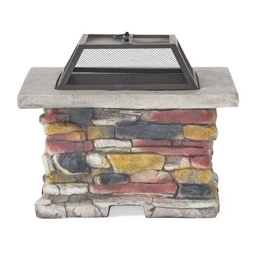 The Outdoor Wood Burning Magnesium Oxide Fire Pit With Lid features a rectangular design, a multicolored stone base in red, yellow, black, and gray, a flat light gray top, and includes a metal mesh lid for safety.