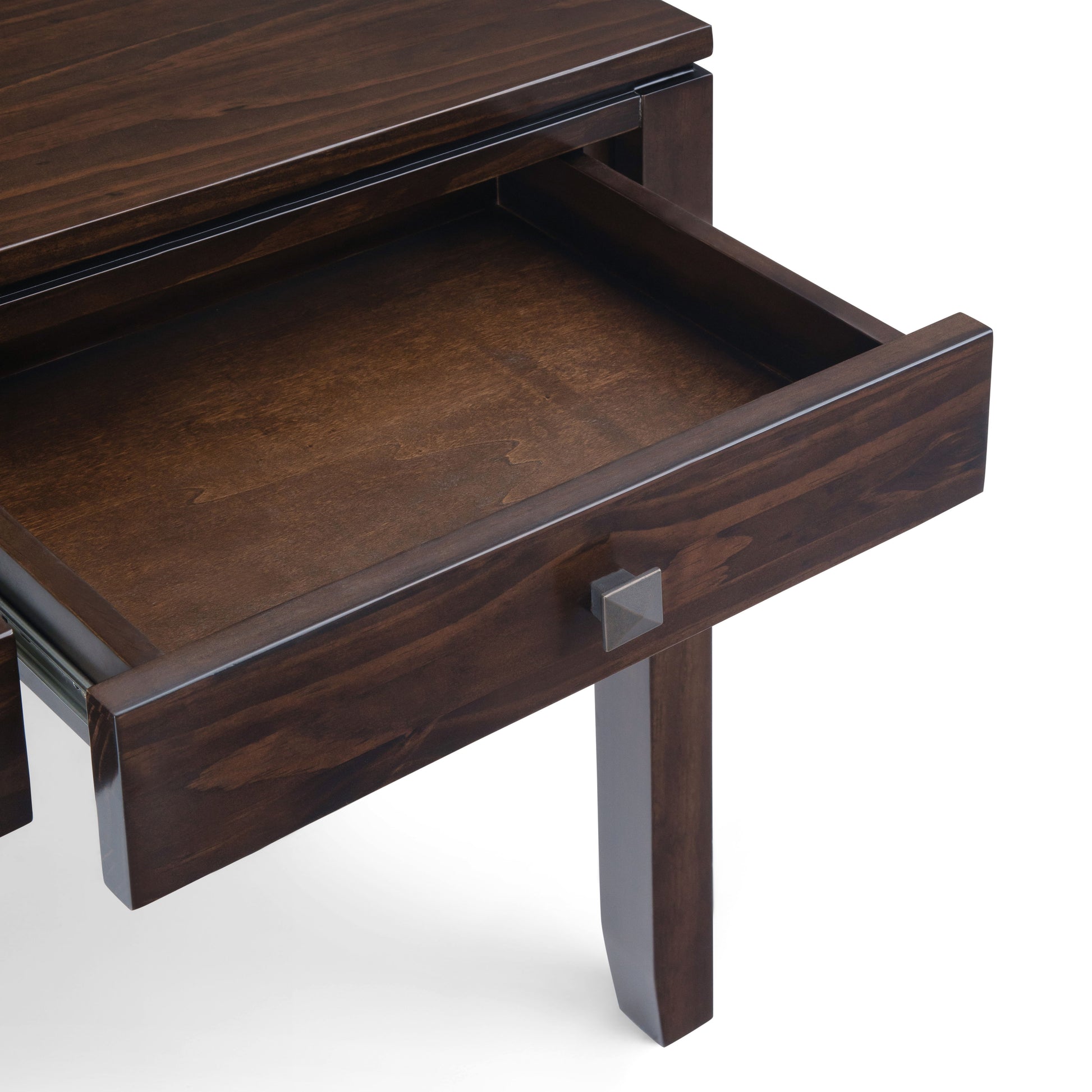 A close-up of the Cosmopolitan Wide Console Sofa Table in mahogany brown, with one rectangular drawer partially open to reveal its empty interior and square metal handle.
