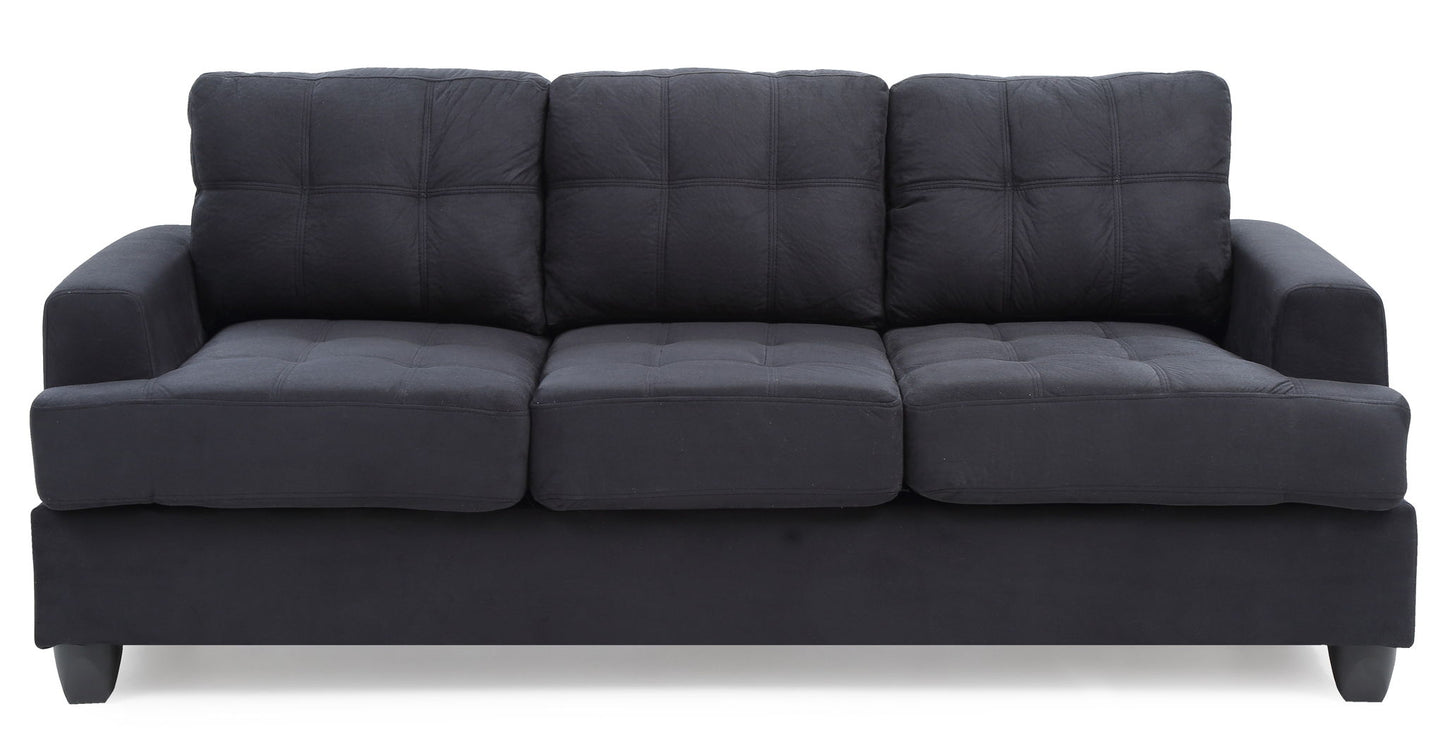 The Sandridge Sofa is a black, three-seater with square tufted cushions and armrests on both sides, shown against a white background.
