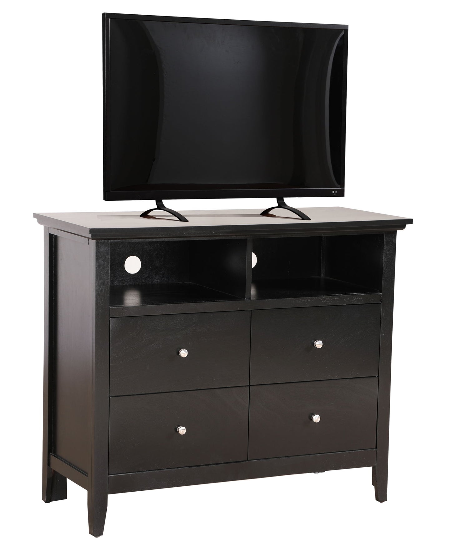 A flat-screen TV sits atop the Charming Media Chest With Storage, a black wooden dresser featuring four drawers and two open shelves with circular cutouts at the back for cable management.