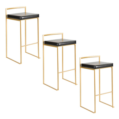 Three Fuji Contemporary/Glam barstools with gold metal frames and black cushioned seats, each featuring a minimalist rectangular backrest and footrest, are arranged in a staggered row.