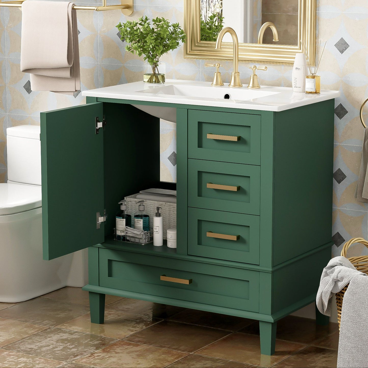 A green Bathroom Vanity, Modern Bathroom Cabinet With Sink Combo Set, features gold handles and stands on tiled floor; its left soft-closing door is open to reveal organized toiletries. A faucet, soap dispenser, plants, and a towel are also visible nearby.