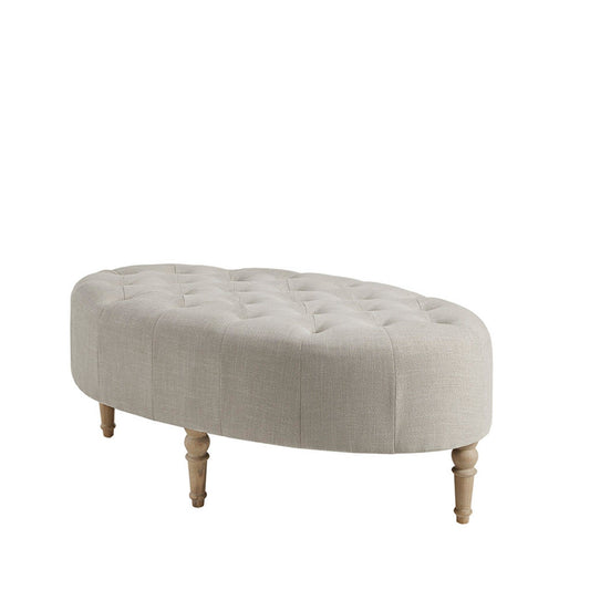 The Fancy Style Design Upholstery Solid Wood - Linen is an oval ottoman with light beige tufted linen upholstery and four light wooden legs, shown against a white background.