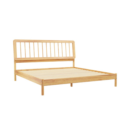The Mid-Century Modern Solid Wood Spindle Bed features a minimalist design with a slatted headboard, natural light wood finish, and is shown angled against a white background without a mattress.