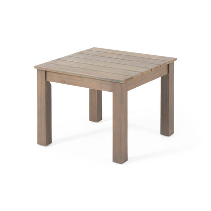 The Halcyon Outdoor Side Table features a square wooden design with four straight legs and a slatted top, displayed against a white background.