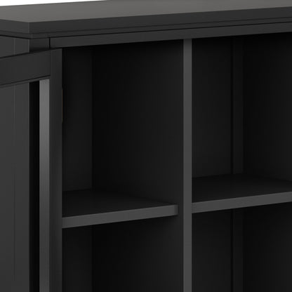 Close-up of the Cosmopolitan - Handcrafted Medium Storage Cabinet in black, featuring four open compartments with two vertical dividers and one horizontal shelf in a sleek, modern frame.