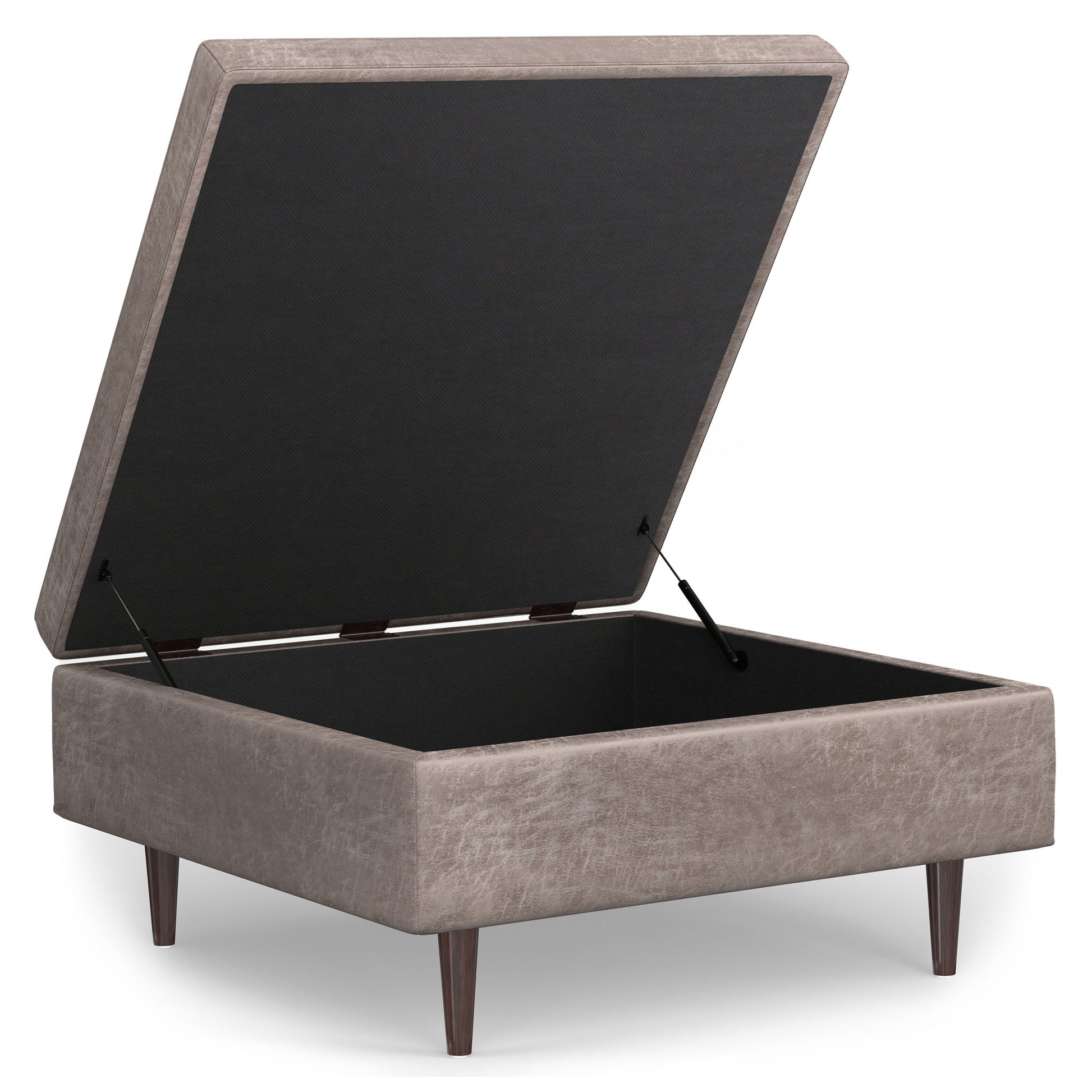 The Shay Large Square Coffee Table Storage Ottoman features beige upholstery, a hinged lid revealing empty storage, and four tapered wooden legs in a mid-century style.