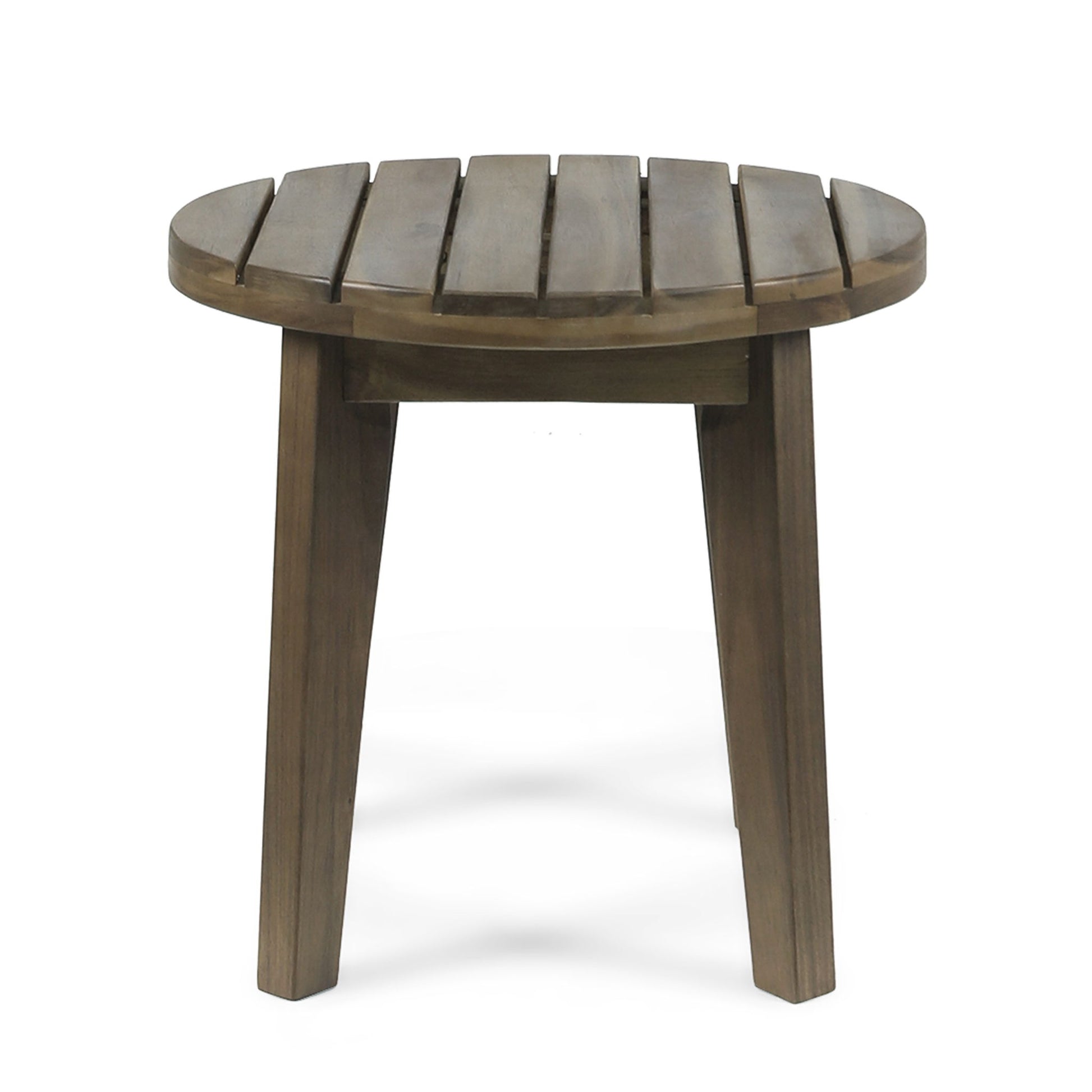 The Outdoor Acacia Wood Side Table features a small, round slatted top and three angled legs for stability, crafted from weather-resistant wood and displayed against a white background.