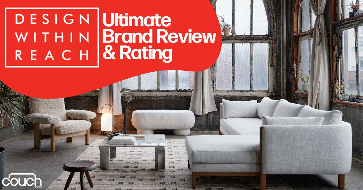 A stylish living room with large windows, featuring a white sectional sofa, a gray ottoman, and a modern coffee table. Text overlay reads "Design Within Reach Ultimate Brand Review & Rating.