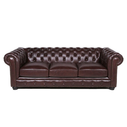 Introducing the Birch Lane Freddie 95'' Leather Sofa—a dark brown Chesterfield design with tufted back and arms, complete with three seat cushions and nailhead trim on the front.