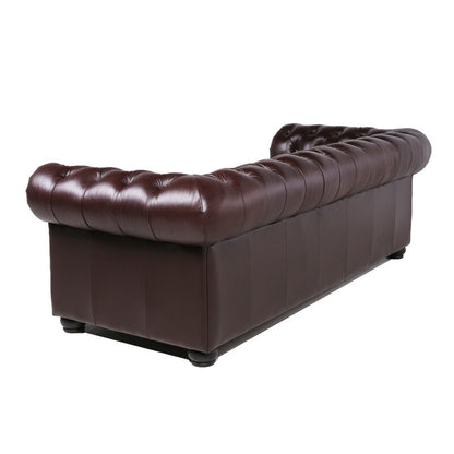 The Birch Lane Freddie 95'' Leather Sofa, a dark brown leather Chesterfield design, is shown from the back. It features deep button tufting and rolled arms, set against a plain white background.