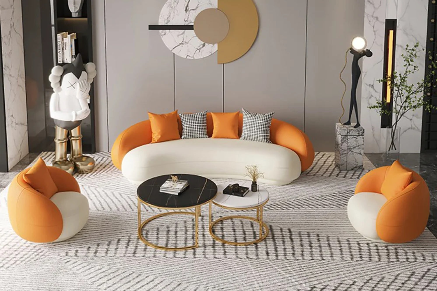 Modern living room with a white and orange curved sofa, two matching chairs, and circular coffee tables. Abstract wall art and a unique sculpture stand nearby. A neutral patterned rug covers the floor, and a tall lamp adds light.
