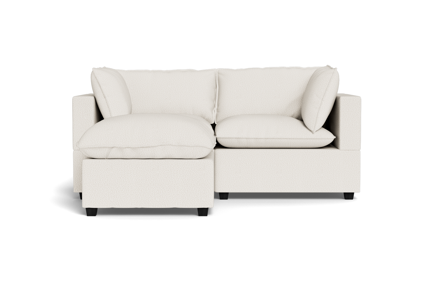 The Kova Pillow Cushion Sofa 86" with Ottoman features a modern design in light beige with plush cushions, showcased against a plain black background.
