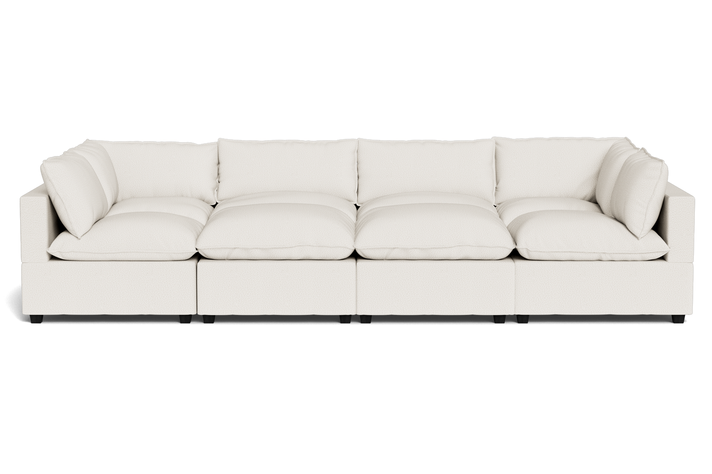 The Kova Pillow Cushion Grand Pit is a modern, large white sectional sofa featuring six seat cushions and six matching back pillows, shown from the front against a plain black background.