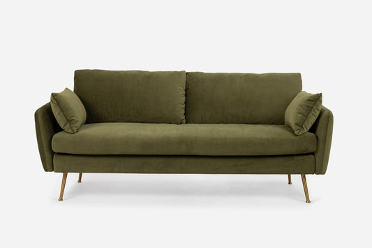 The Park Sofa is a modern olive green piece with plush cushions, angled armrests, and slim gold metal legs, shown against a plain white background.