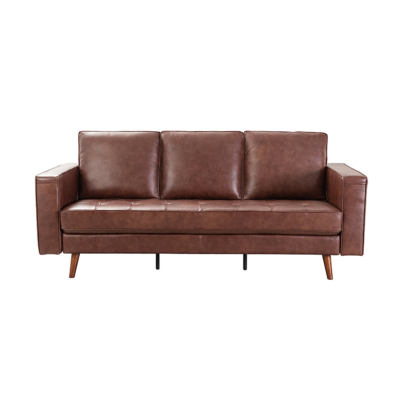 The Anatole Leather Sofa features brown leather upholstery, three cushions, square armrests, and wooden legs. Its modern and minimalist design makes it perfect for a living room setting.