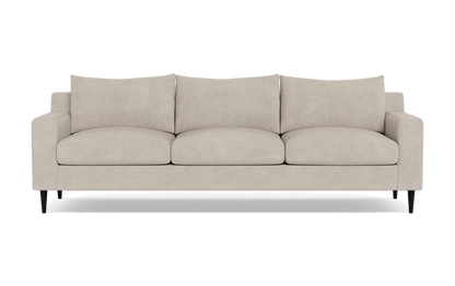 The Sloan Custom 3-Seat 95" Sofa, featuring plush cushions and sleek black legs, is displayed against a plain background. Its simple and modern design offers a contemporary look.
