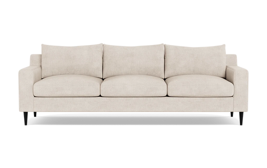 The Sloan Custom 3-Seat 95" Sofa features a beige upholstery with smooth finish, complemented by three plush and comfortable cushions. It has straight armrests and stands on four dark legs, all set against a white background.