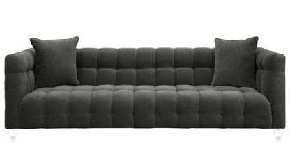 Introducing the Bea Velvet Tufted Sofa, a dark green masterpiece featuring clear acrylic legs and a pair of matching cushions. Its design boasts a modern and plush aesthetic, highlighted by a sophisticated grid-like pattern on the velvet upholstery.