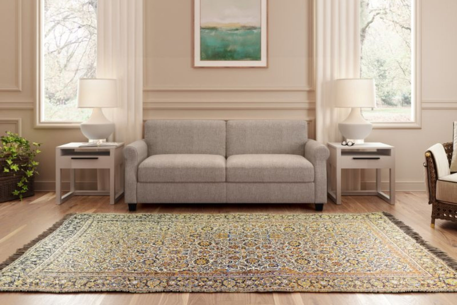A cozy living room featuring a gray sofa centered against a beige wall with paneling. A decorative rug with intricate patterns lies on the wooden floor. Two lamps on side tables flank the sofa, and a landscape painting hangs above it.
