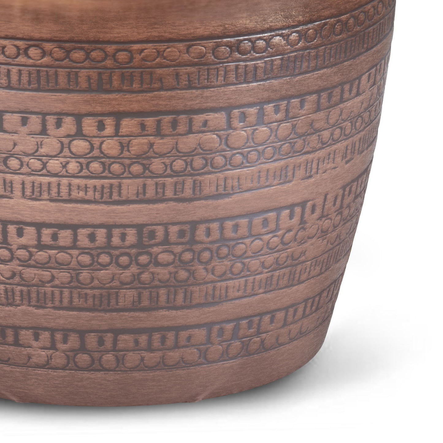 A close-up of the Johnsen Handcrafted Large Metal Accent Table in copper, showing horizontal rows of etched geometric patterns—squares, rectangles, and circles—on its surface against a white background.