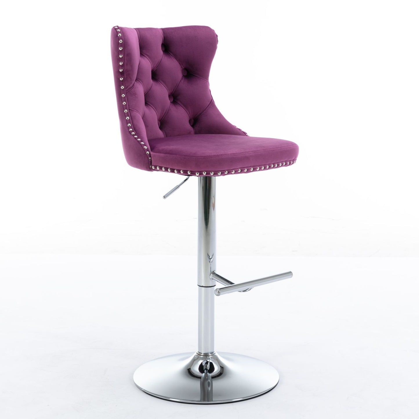 The Swivel Velvet Barstools feature tufted purple velvet seats, adjustable seat height (25-33”), chrome pedestal base with footrest, and silver nailhead trim. Modern and comfy, these barstools (set of 2) are perfect for your home pub or kitchen island.