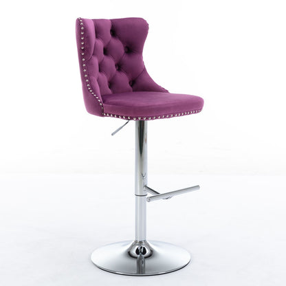 The Swivel Velvet Barstools feature tufted purple velvet seats, adjustable seat height (25-33”), chrome pedestal base with footrest, and silver nailhead trim. Modern and comfy, these barstools (set of 2) are perfect for your home pub or kitchen island.