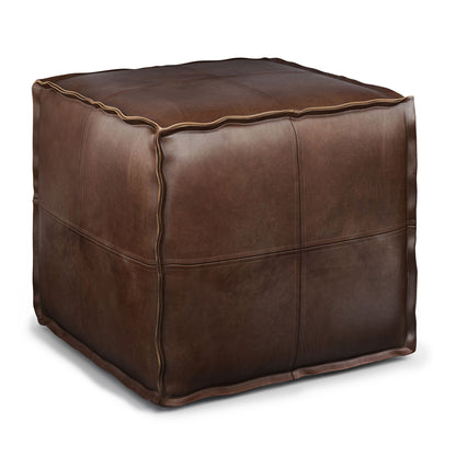 The Brody - Versatile Square Pouf is a brown leather ottoman with visible edge stitching, shown against a white background.