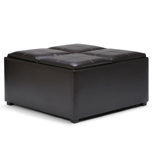 The Avalon Square Coffee Table Storage Ottoman in Tanners Brown features a tufted cushion top, visible stitching, and stands on short black legs.
