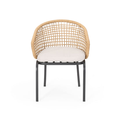 The Outdoor Wicker Chair features a curved wicker backrest, light beige seat cushion, and black powder-coated iron legs, shown against a plain white background.
