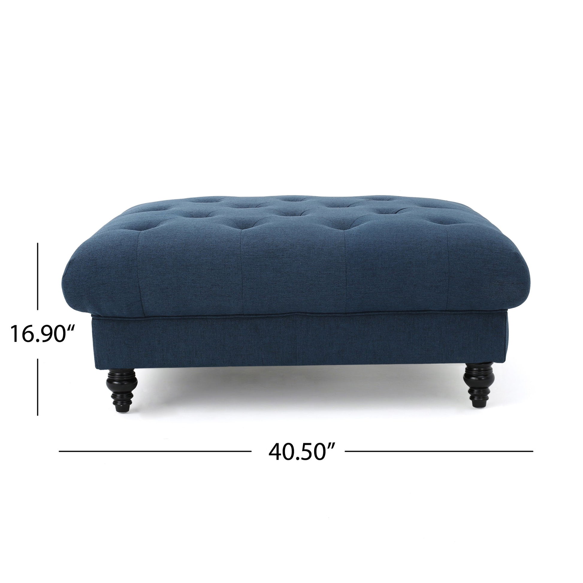 The Madrid - Tufted Ottoman Footrest is a dark blue, rectangular ottoman with black turned legs, measuring 16.9" high and 40.5" wide, shown from the front with labeled dimensions.