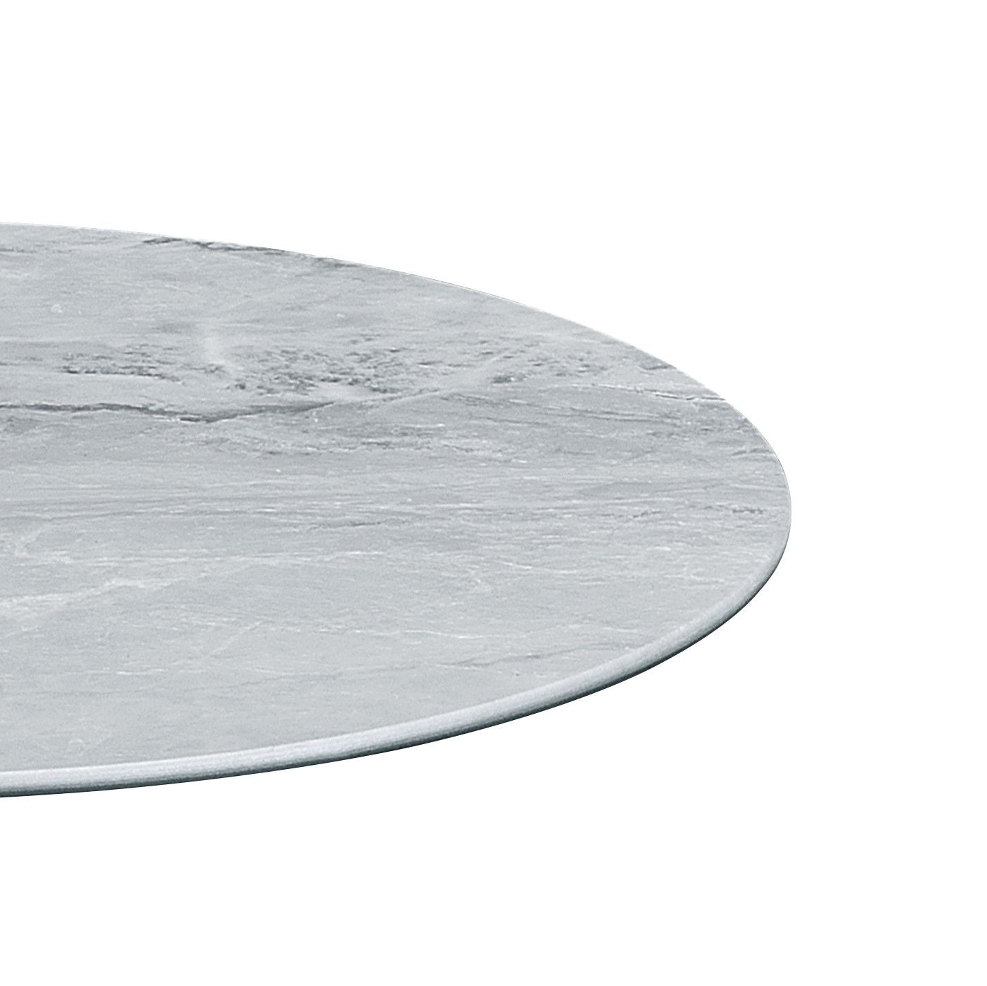 A close-up of the edge of the Circa - 17.5" End Table, featuring a round, light gray marble-textured top with natural veining patterns against a white background.