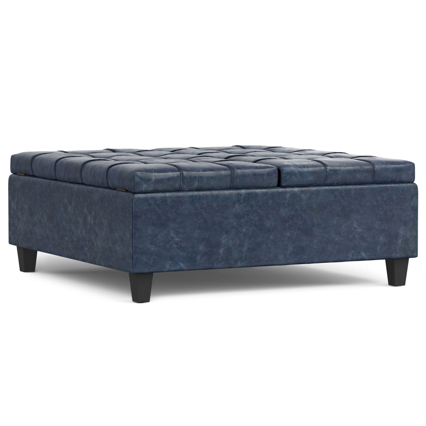 The Harrison Upholstered Coffee Table Storage Ottoman features a square, dark blue tufted top in textured faux leather, short black legs, and cushioned seating. Its modern design offers both stylish seating and versatile storage or coffee table functionality.