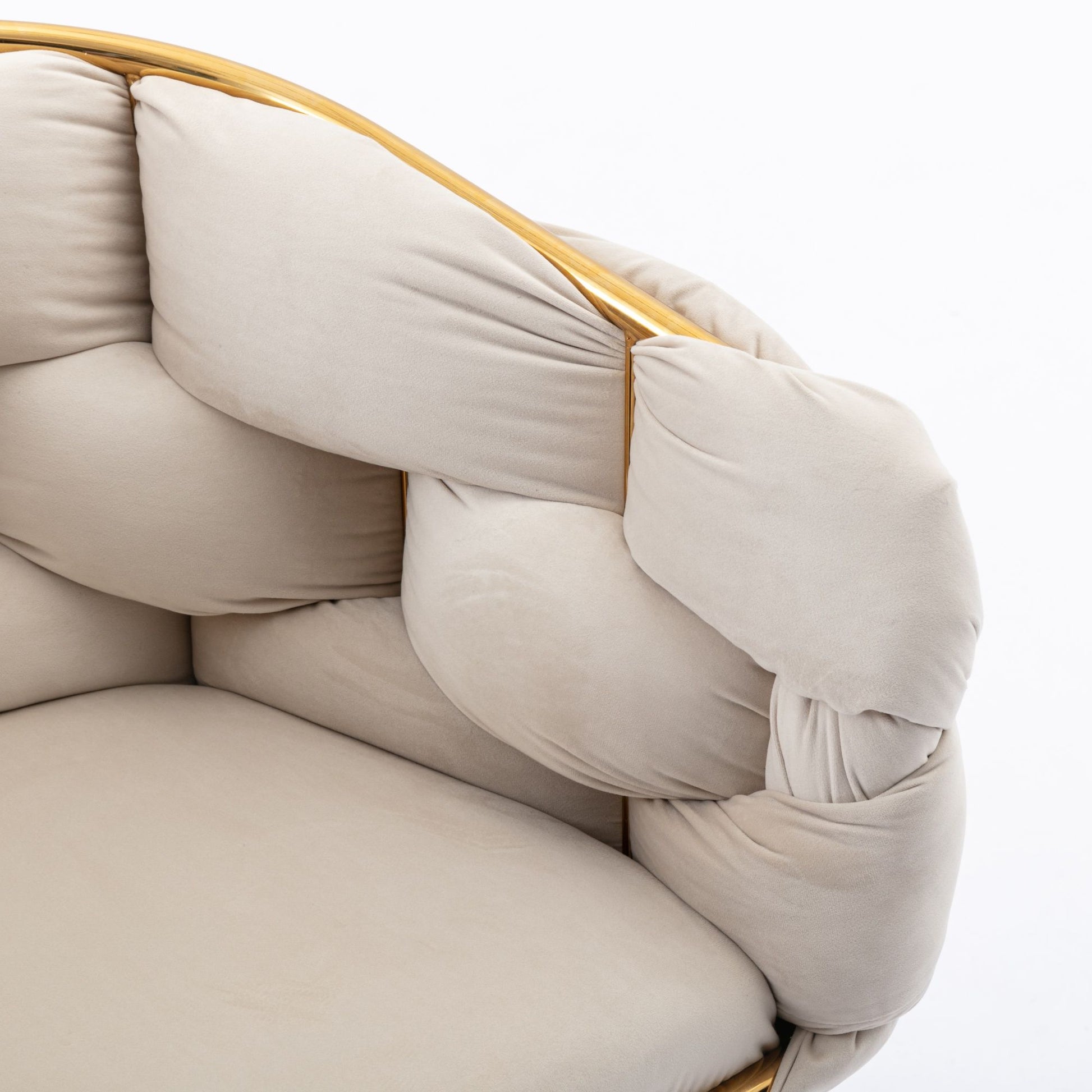Close-up of the Luxury Modern Simple Leisure Velvet Single Sofa Chair featuring plush, tufted beige cushions and a curved wooden frame, perfect for bedrooms, dressing tables, or as a stylish manicure stool.