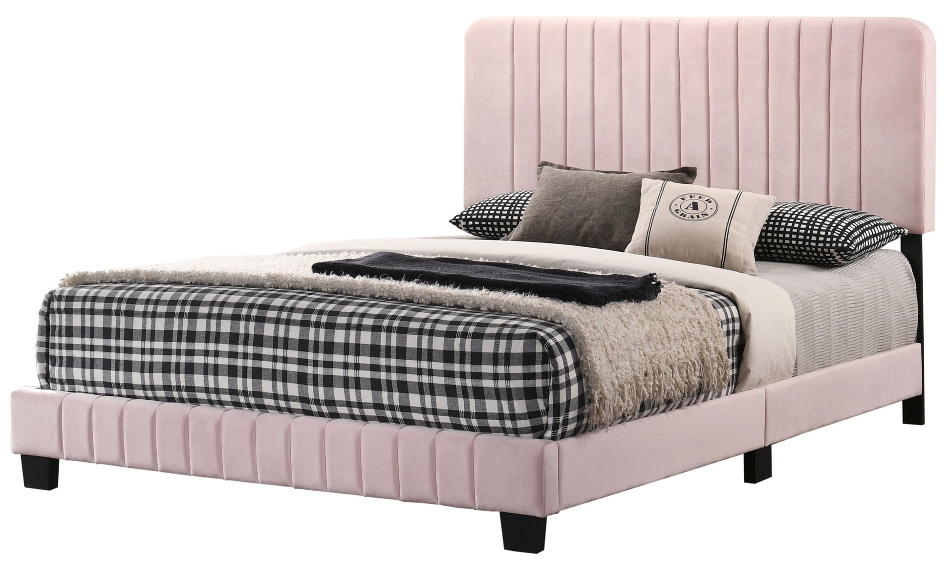 The Lodi - Bed features a tall, light pink upholstered headboard and frame, styled with black and white plaid bedding, a beige throw blanket, and several neutral-toned decorative pillows for a modern touch.