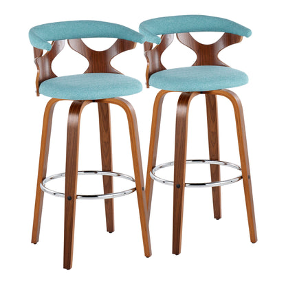 A pair of Gardenia Mid Century Modern Barstools with curved wooden legs and backrests, turquoise upholstery, and round chrome footrests are arranged side by side against a white background.