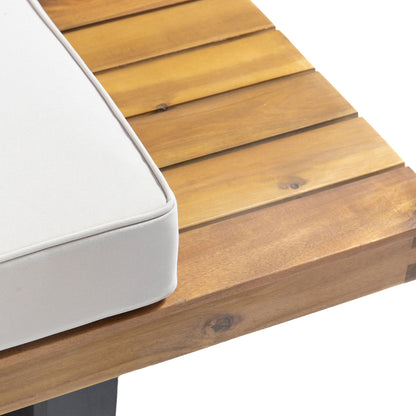 Close-up of the Sebastian - 2 Seater Sofa, featuring a light beige cushion on a wooden slatted base, highlighting the cushion corner and natural wood grain.