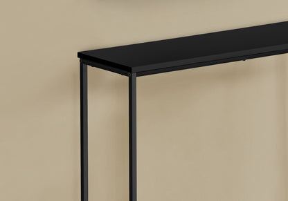 The image highlights the corner and side detail of the Accent Console Table For Entryway, featuring stable support and a contemporary modern design in minimalist black metal, placed against a beige wall.