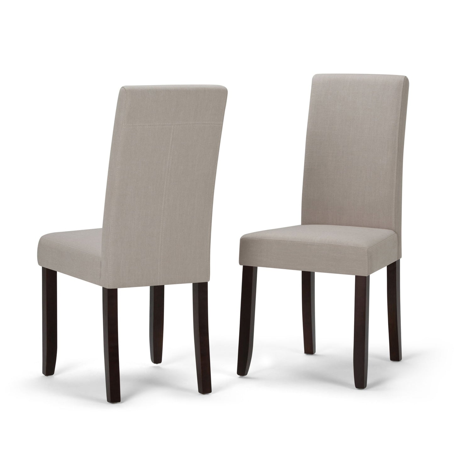 The Acadian Upholstered Parson Dining Chair set includes two chairs with light beige fabric seats and backs and four dark wooden legs. One chair is shown facing forward, the other angled to display the back design.