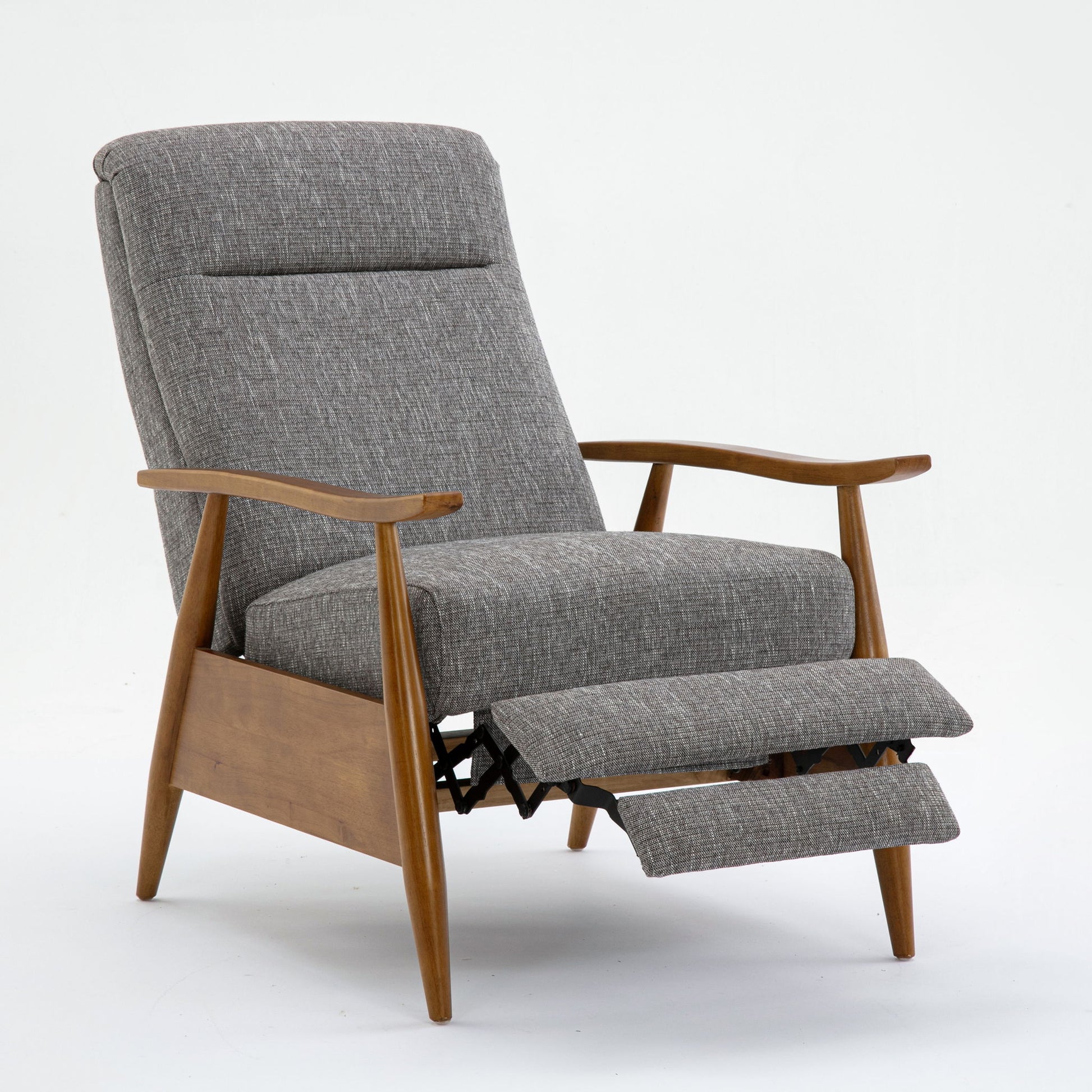 The Vaughn Push Back Recliner features light gray fabric upholstery, solid hardwood legs, and wood armrests. The footrest is extended to display its reclining function. Shown against a plain white background.