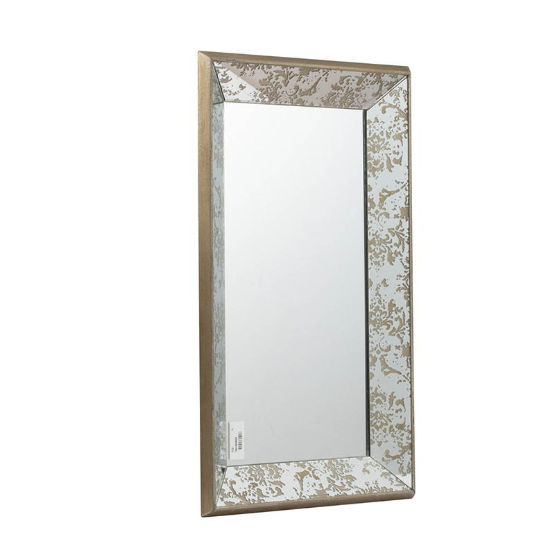 The Antique Rectangle Mirror With Floral Accents features a wide, textured gold and silver ornate frame. Displayed at a left angle, this mirrored tray wall mirror showcases its elegant floral border and reflective surface.