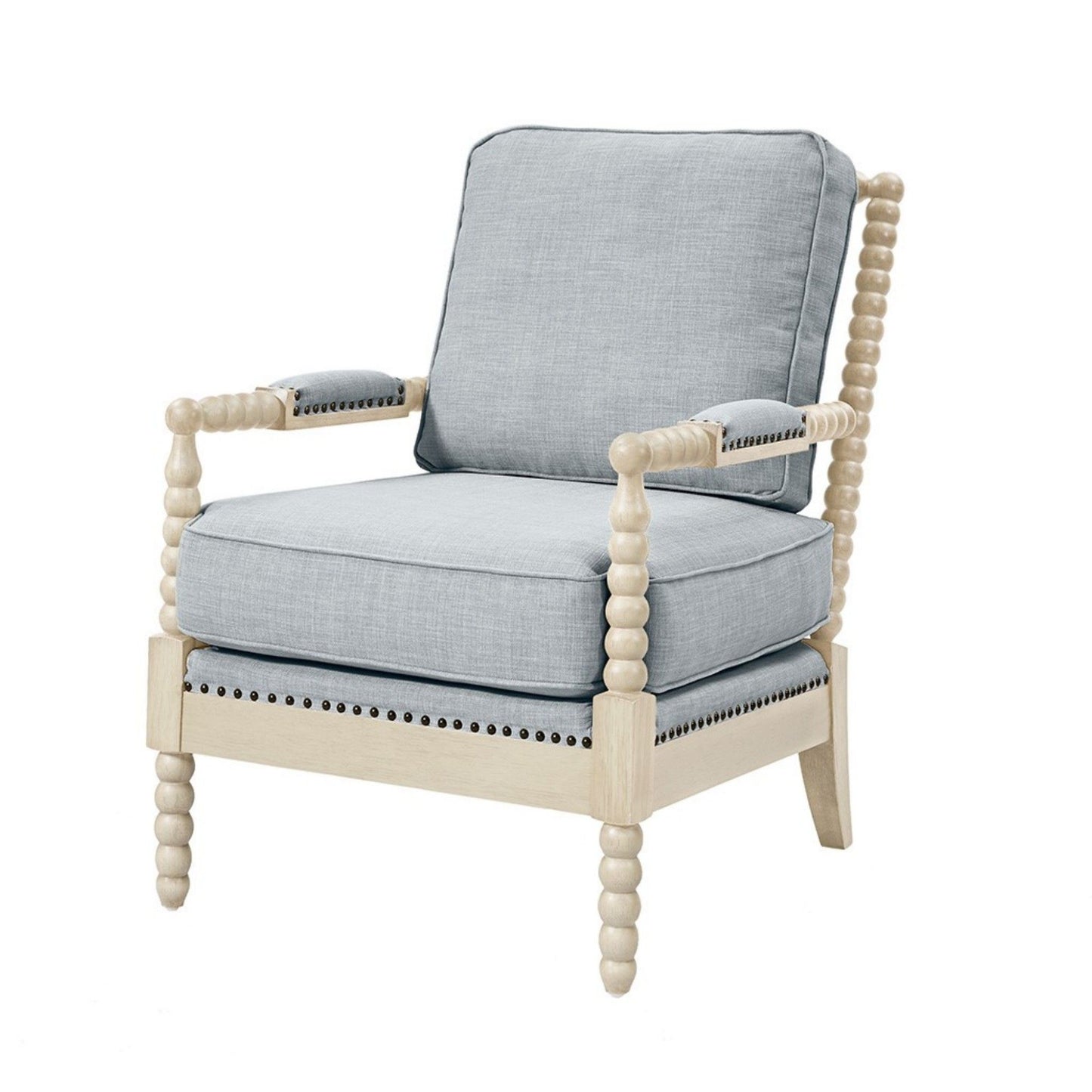 A light wooden Arm Chair With Open Back Spindle Design, featuring padded armrests, light gray cushioned seat and backrest, and decorative nailhead trim along the base.