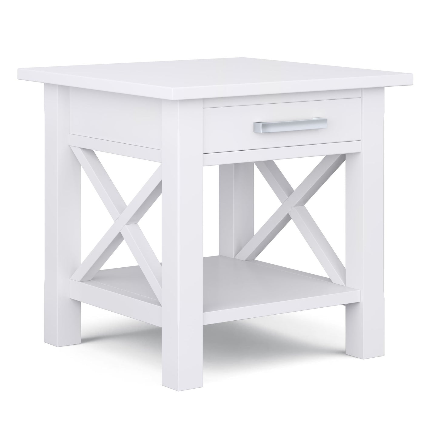 The Kitchener - Handcrafted Table is a white wooden end table featuring an X-shaped side design, one drawer with a silver handle, and an open lower shelf.