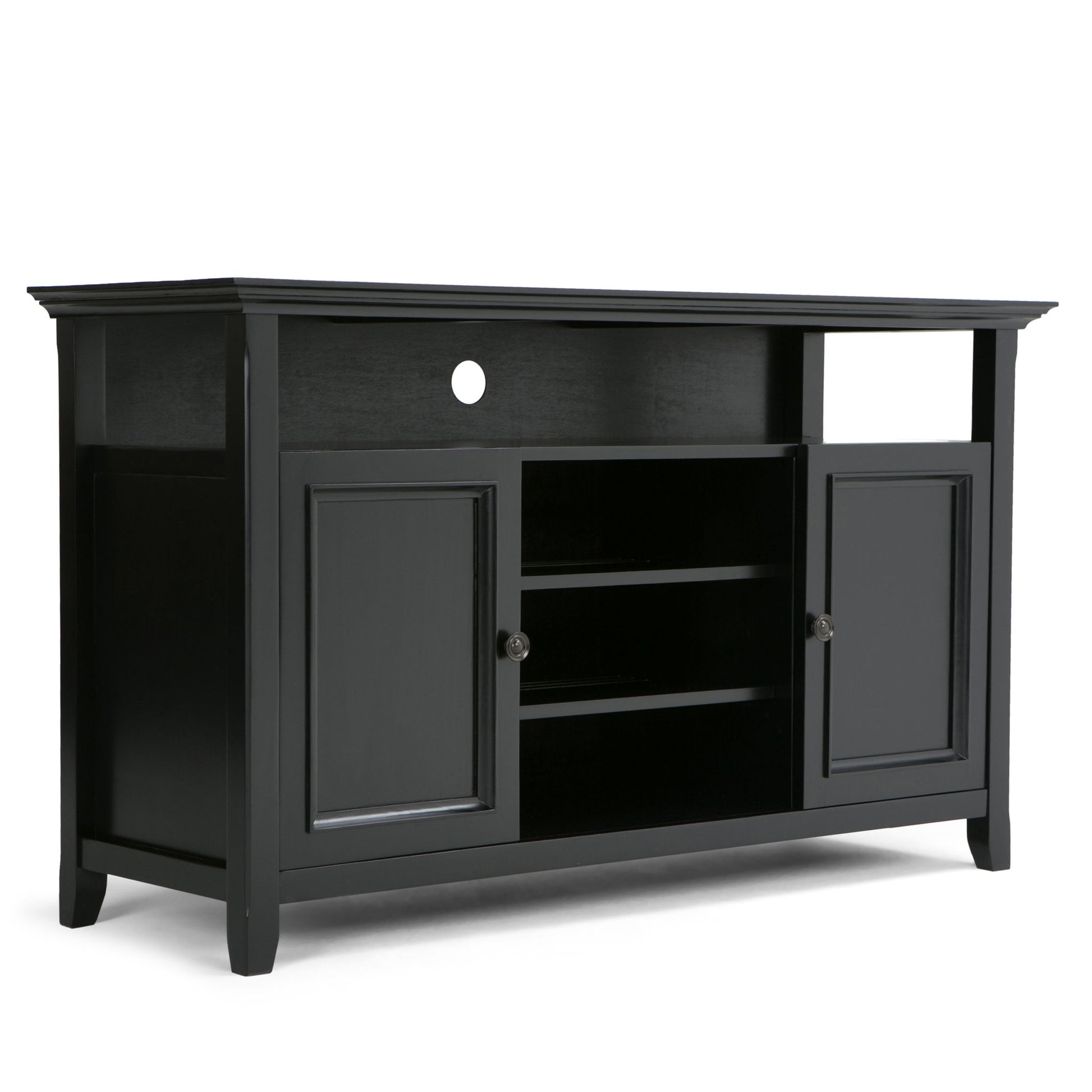 The Amherst TV Media Stand is handcrafted in black wood, featuring two side cabinets, two central open shelves, and a spacious open area above with a circular cable management hole at the back.