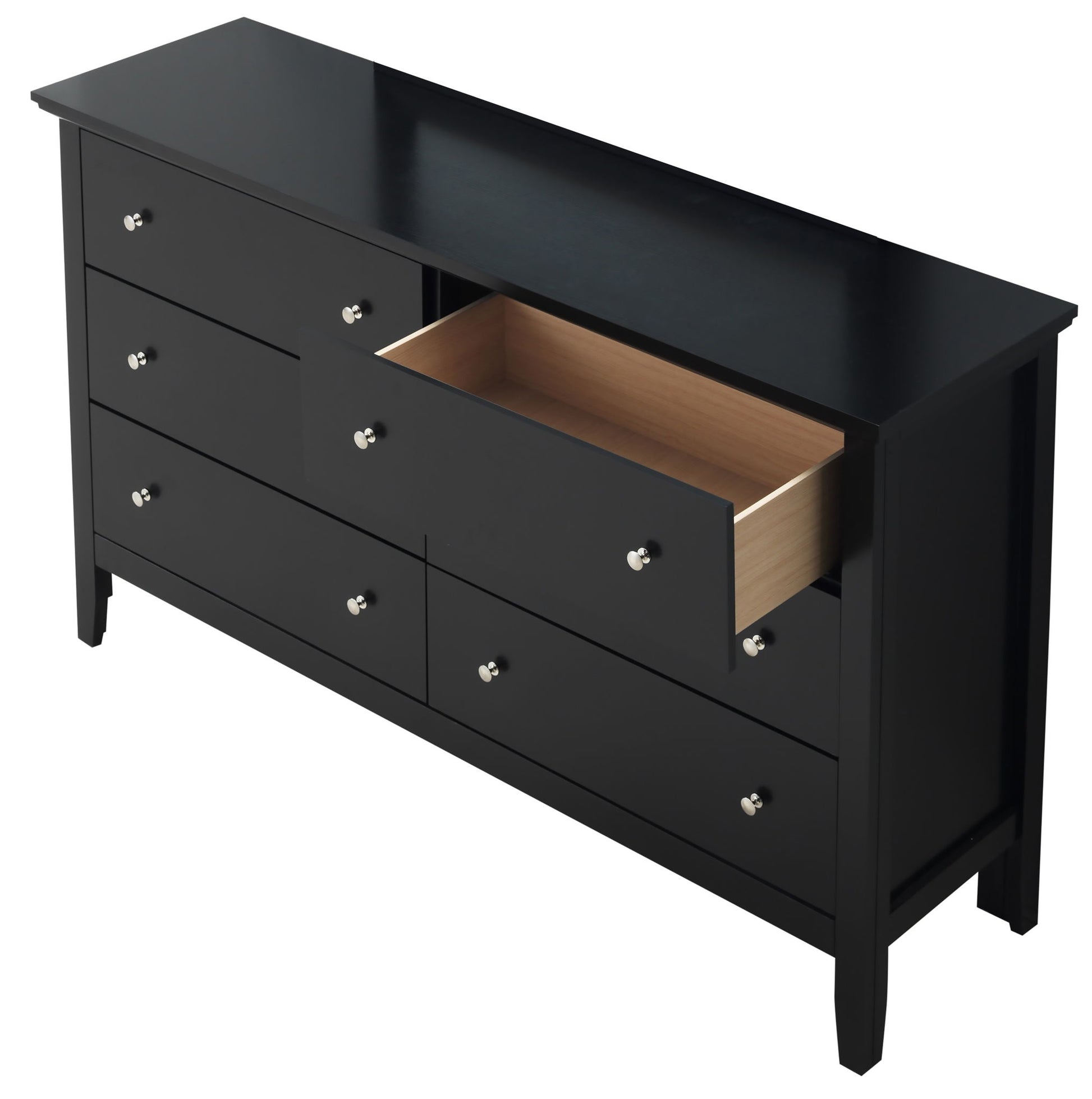 The Primo Dresser is a black wooden piece with six drawers, silver knobs, one middle drawer partially open to reveal a light wood interior, and stands on four short legs.